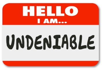 The words "Hello I am Undeniable" written on a name tag sticker